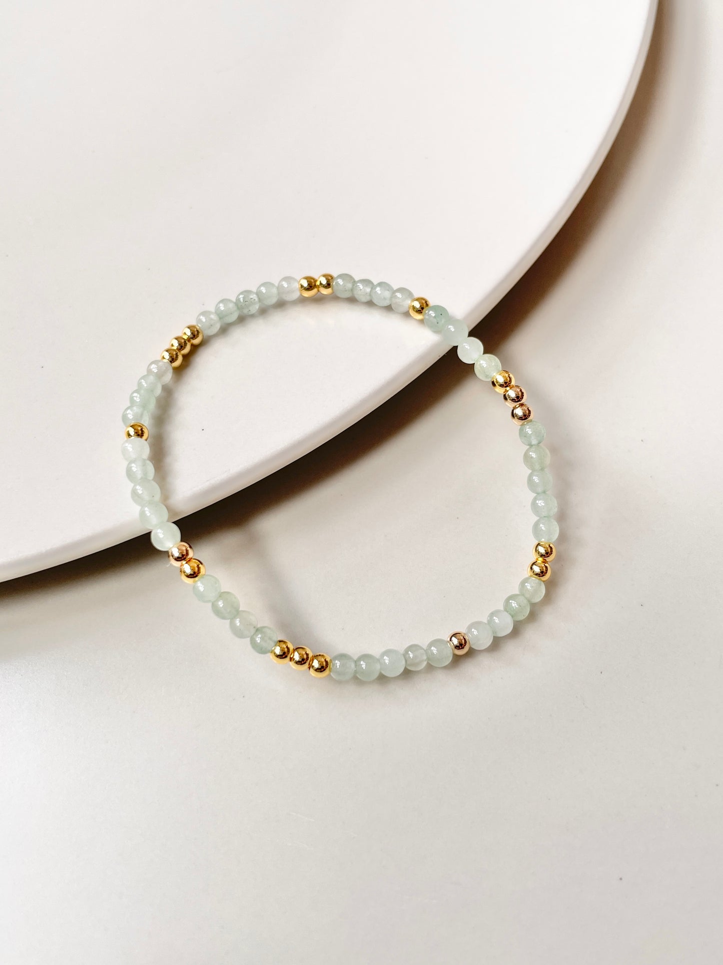 Delicate Aventurine Bracelet, Adorned with Gold Accents, Bestowing Fortune