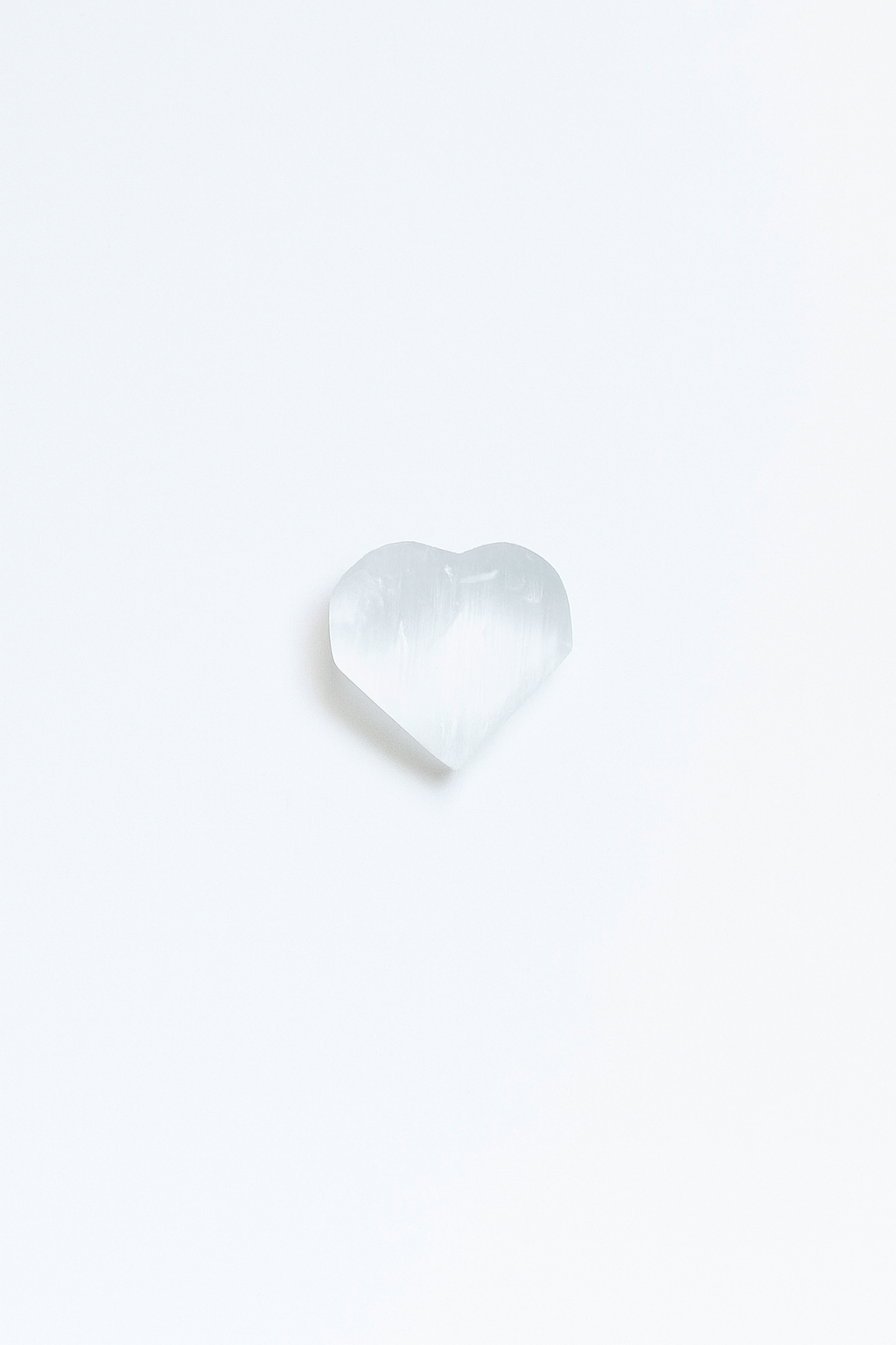 The Cleansing Heart Stone – Polished Selenite Palm Stone